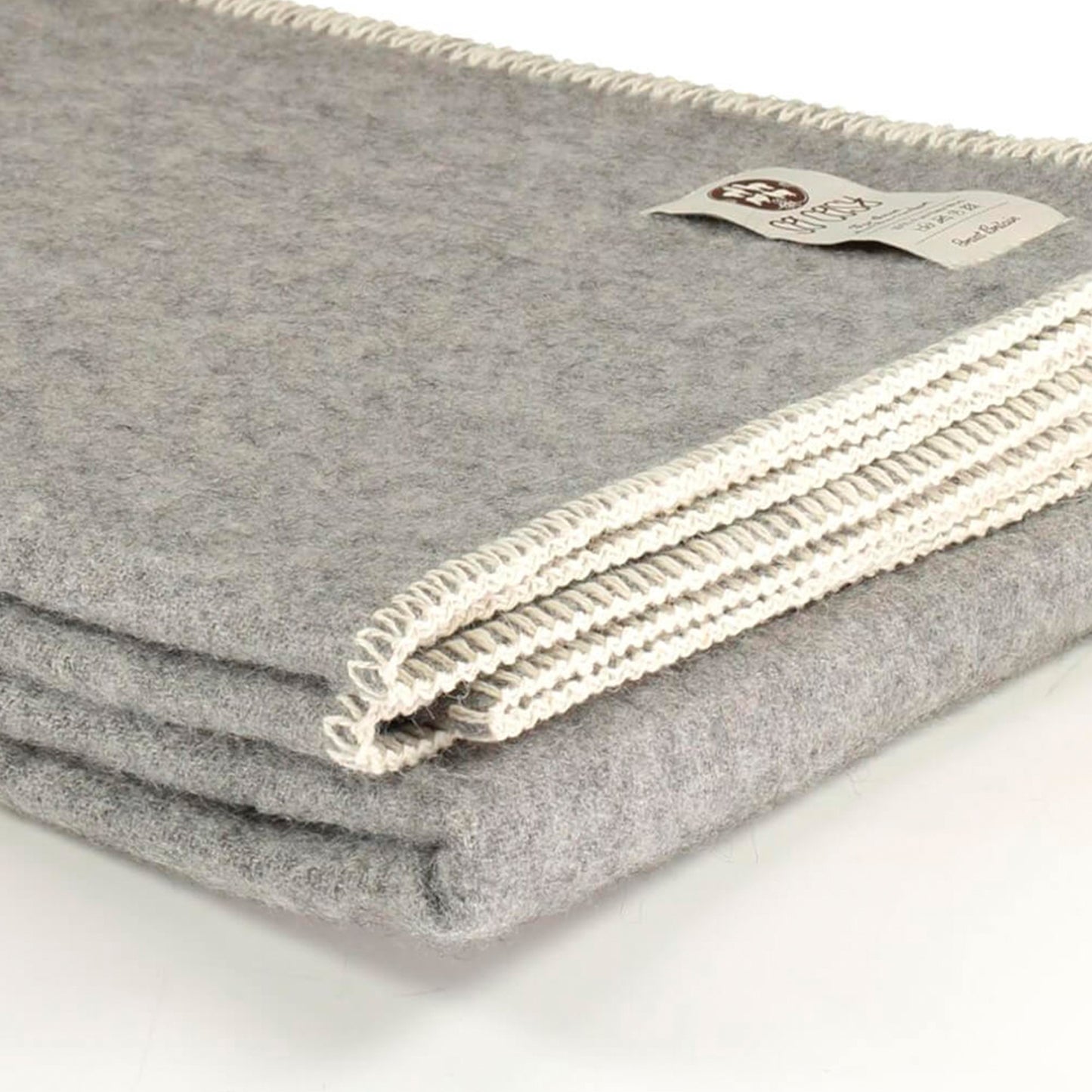 Soft grey undyed wool throw